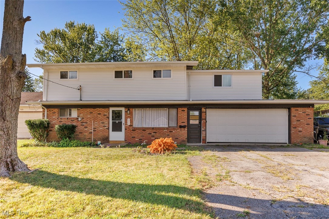 Welcome to 523 Purdue ave. in Elyria's Eastern Heights, a tastefully renovated colonial home ready for its new care taker. This home sits on nearly a quarter acre lot with over 1,800 square feet, four bedrooms, two full bathrooms and two car garage. As you enter the home through the front door you step into an inviting living room drawing you into the rest of the home. The floor plan allows you to proceed through the home with comfort into the kitchen, through the kitchen you will find your dining room and an additional family room. Also on the first floor is a bedroom with ample space for traditional usage or converted into an office. Throughout the first floor updates include: new Vinyl Plank flooring throughout, new Carpet in Bedroom, new Appliances, new Counter tops, new Cabinets, new Backsplash, new Water heater, new full bathroom with a new vanity, and tiled shower, tastefully painted for a modern feel. The second floor offers three bedrooms, the Master bedroom features vaulted ceilings and great space, a Laundry room with closet and a renovated Full Bathroom. Exterior upgrades include a new Roof, new Central Air unit and new Siding. Additional upgrades were made to the Plumbing and to the Electrical work throughout the house. You don't want to miss out on this wonderful house.