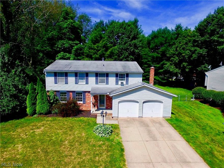 "I would like a house with plenty of space for entertaining guests and I want it to have a nice fenced in backyard for the pets." We have all heard or said this before. Well this is it!!! A great home in Munroe Falls with 4 Beds, 2.5 Baths including an updated master bathroom as well as a sizable walk in closet. The new home owners will enjoy having a finished basement where they can relax or perhaps enjoy a hobby. The backyard is great for having a cookout with friends and family... I know from experience! With the attached garage it will be a little bit easier for the new home owners to brave the cold snowy Ohio winter when they aren't having to brush their cars off every morning. Don't miss your chance to see this GEM today!