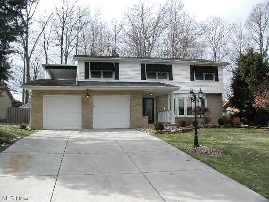 IMMEDIATE OCCUPANCY!!,Excellent Opportunity and Location on the end of a Private Cul- De- Sac. Updated and Remodeled with NWR windows, bathrooms, concrete driveway, kitchen, and much more.  4 Bedroom 2.5 Bath Brick Colonial. Nice Eat- In- Kitchen updated with a mobile Island, Granite Counters, Cherry Upgraded Cabinets, Laminate Flooring, Stainless Sink, Appliances, and more. Formal Dining Room with Hardwood Floors. Open 1st Floor Living Room includes a 5- Bow NWR Bay Window and Hardwood Floors. Enjoy the 1st Floor Family Room with a WB Fireplace and a sliding door leading onto the patio and uniquely Landscaped Private Wooded Fenced Yard. Going upstairs, you will find a Spacious Main Bedroom with a full Remodeled master bath, hardwood floors, and a sliding doors leading onto a cozy covered balcony. (Really Hard to Find !!) Going down into the Lower level full basement, you will enjoy the finished Rec-Room with carpet, glass block windows and lots of storage area. 2- Car HEATED  Attached