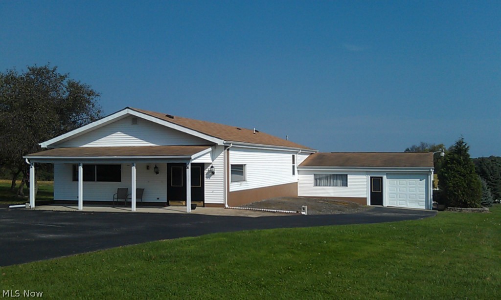 Commercial/Retail building for Lease. Former Susan's Antiques in excellent condition and ready to go. Newer carpet - lighted showcases - cashiers counter - restroom with shower - warehouse space - workshop area make this building ideal for many uses. Exercise Spa - Farm Market - Antiques - Woodworking - Equine or Pet Supply - Alpaca or Llama merchandise - Let your imagination run wild. Large paved parking lot and country location just south of St. Rt. 422 or North of St. Rt. 305. The pride in ownership is evident in this well maintained property.