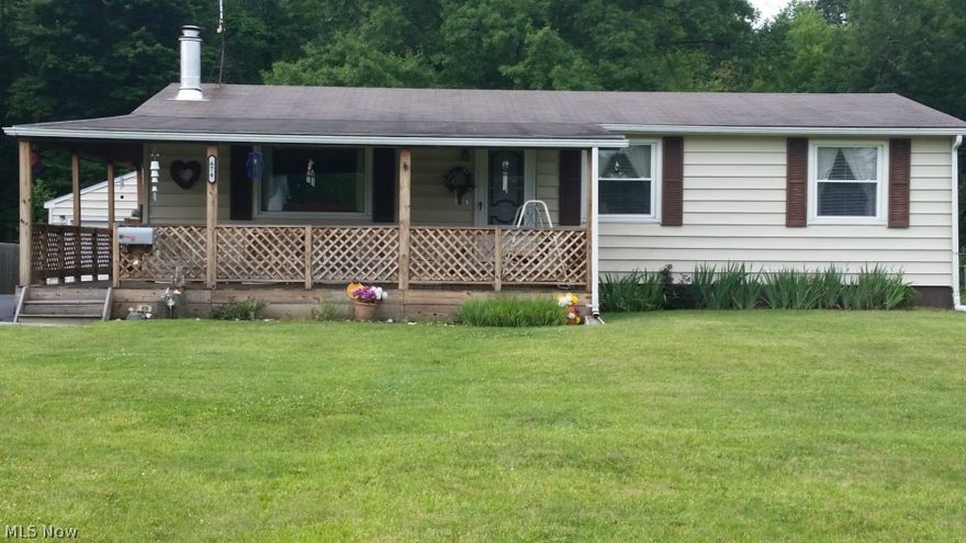 This beautiful ranch home is located in Liberty Township.  Furnace and central air were updated in 2009.  Security system and all appliances stay.  The home has a wrap-around porch, partially finished basement with bar, two and one-half car detached garage with a side patio.  Beautiful back yard and nicely landscaped.