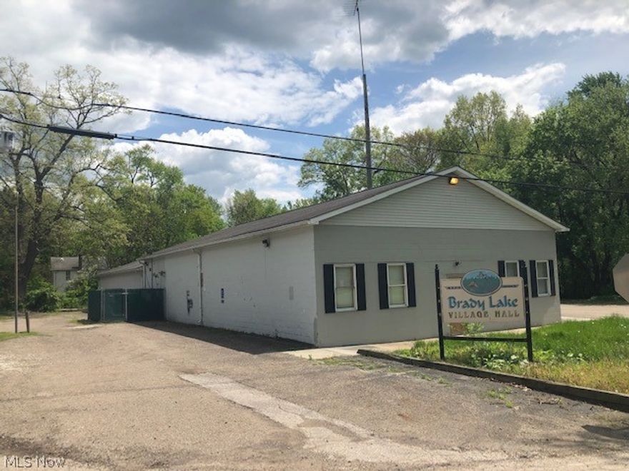 Former Brady Lake Village Townhall & Police Station.  Approximately 5250 sq. ft. Block & Frame building with a large community room, restrooms, and miscellaneous small offices with additional storage area.  Zoned R-1/C-1