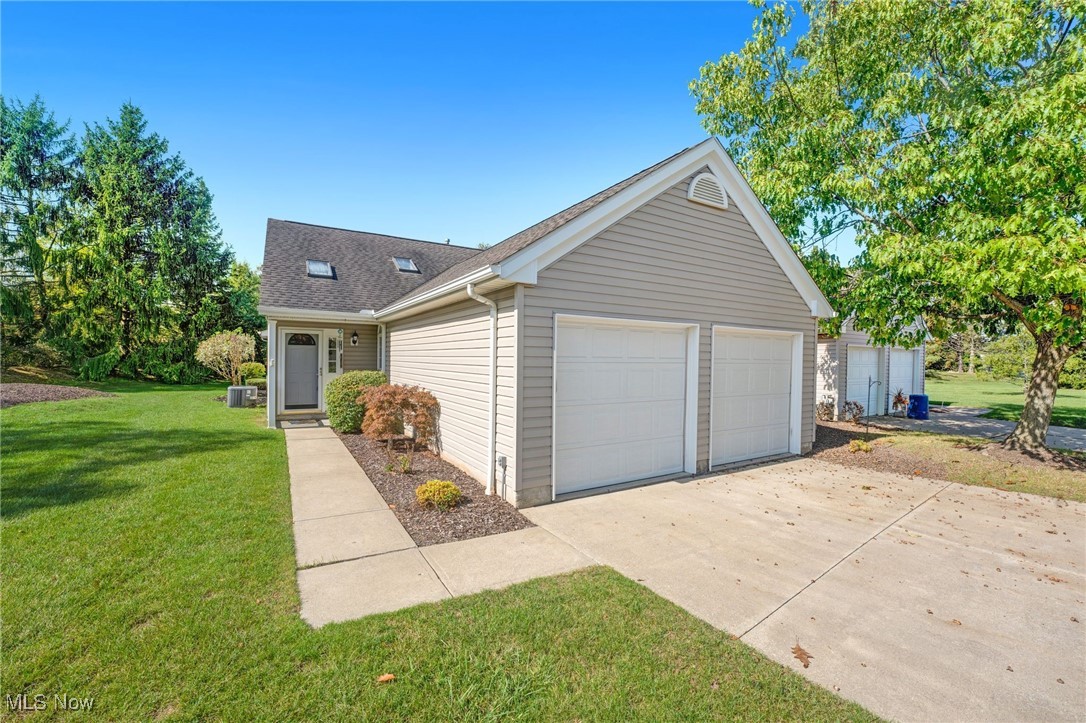 Welcome to Springfield Commons where you'll find this charming single-family rambler ranch situated on a beautifully landscaped lot. Mature trees create a lovely blend of sun and shade enhancing the tranquility of the property. Step inside and discover a spacious living area spanning 1,768 sqft, featuring vaulted ceilings, skylights, natural woodwork, recessed lighting, and a palette of accentuating colors that create a warm and inviting atmosphere. The chef's kitchen is a true highlight, boasting stunning countertops, elegant oak cabinetry, 2 pantries, and sleek stainless appliances including range, wall oven, refrigerator, microwave, and dishwasher. The breakfast bar adds a delightful touch for casual dining. The floor to ceiling, double-sided gas fireplace provides cozy warmth and serves as a focal point for both the great room and versatile space that can be used as a den or office. This room has french door access to the covered deck with a ceiling fan, and the patio area, the perfect space for enjoying fresh air and outdoor relaxation. The generously sized master includes a private en-suite bathroom and a spacious walk-in closet ensuring comfort and convenience. A second bedroom on the main level, along with a creative loft space overlooking the great room, offers flexible options for a third bedroom, craft area or playroom. The primary bath features new flooring and walk-in shower while the laundry room doubles as a utility space equipped with new flooring, sink and cupboard space for organization. With an attached two-car garage, storage will never be an issue in this well-maintained home. Experience comfort, style, and convenience in a community just minutes away from schools, businesses, retail, and amenities. This is a must-see property!