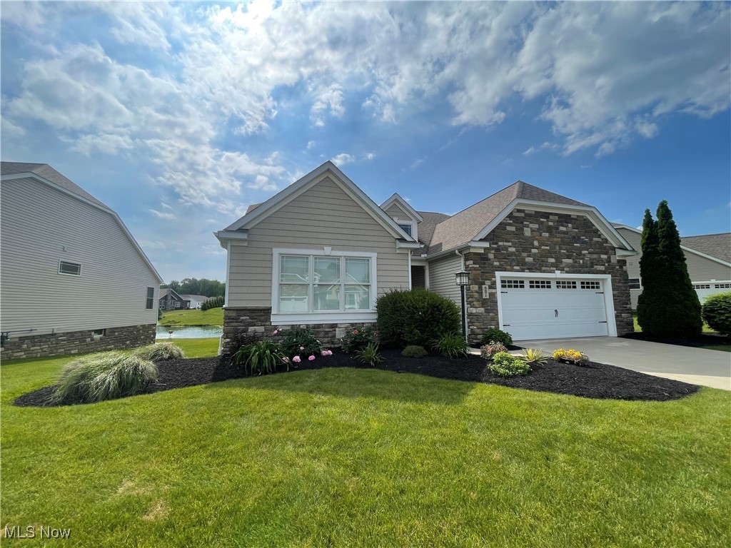 Welcome to a beautiful detached condo with water views in Jackson Township. This home is tucked away in a private community with waterviews and beautiful lighting throughout. The large open floor plan and soaring ceilings are dramatic and a rare find in a newer condo. A large owners suite and 3 additional bedrooms make this a very spacious home. The large partially finished basement has large windows and high ceilings which make for a very welcoming retreat or additional living quarters and an additional large unfinished basement space that offers options! A transferable warranty on the foundation until the year 2044 from Tremco from the original builder. All lots are sold in this development so schedule a showing now!