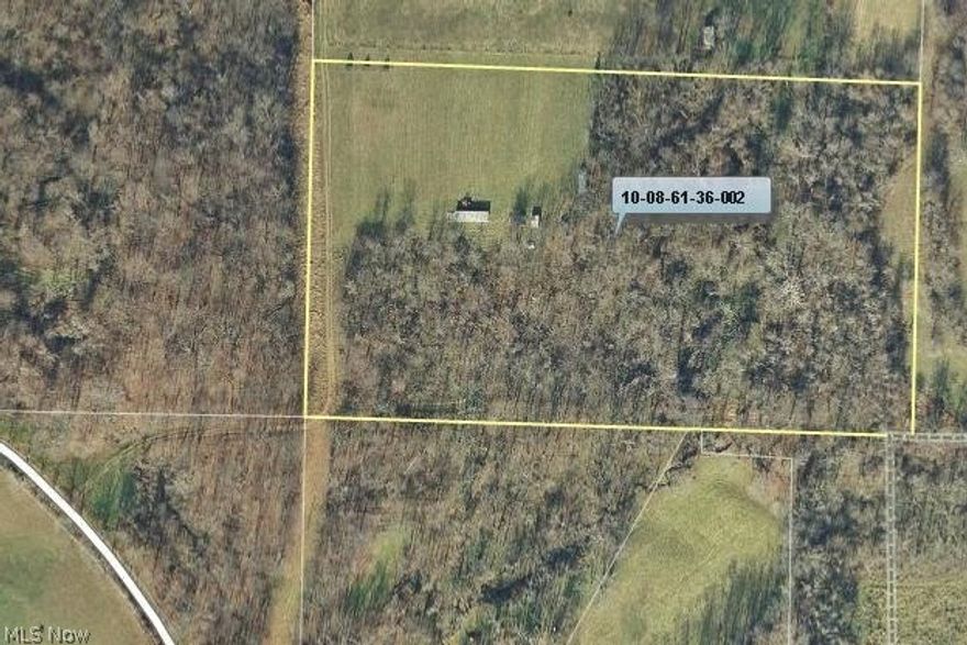 This 10 acre parcel has been perked and was approved for a well and septic. The well was drilled but the septic was never put in place. The auditors card says it is there but owner says never done. There is a 50 ft right into property and phone company has fiber optic cable right of way. Any mineral rights that are there will convey to the buyer but buyer is responsible for any mineral search. There is an older mobile there that is being used as a workshop.