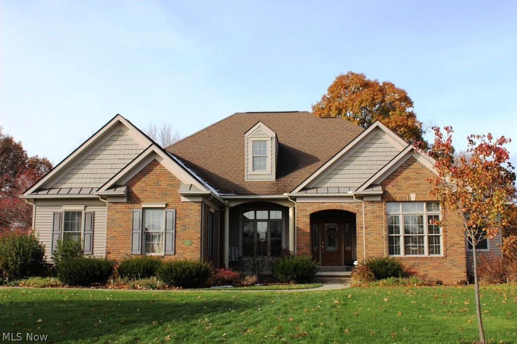 Outstanding architectural ranch, quality built with 3 bedrooms, 2.5 baths, den, 2114SF, open floor plan and split bedroom design, situated on .50 acre cul de sac lot* Foyer with 10' ceilings, crown molding, wood floor, beveled glass door & side lights* Vaulted great room with fan & gas log fireplace* Pillars, defining formal dining room, with 10' ceilings, crown molding, wainscoting & wood floor* Den with built in book shelves/cabinet & 10' coffered ceiling* Designer kitchen with breakfast bar, pantry, ceramic floor, stainless appliances & bayed eating area with built in china cabinet plus slider to patio* Master bedroom with light accented deep tray ceiling, walk in closet & master bath with double vanity, private lav, shower, jetted tub & tile floor* Laundry with tile floor* Full 13 course unfinished basement with glass block windows, shelves, sump pump (battery back up) & plumbed for half bath* Heated 2 car side load garage* Quality features includes Brookhaven Woodmode cabinetry,