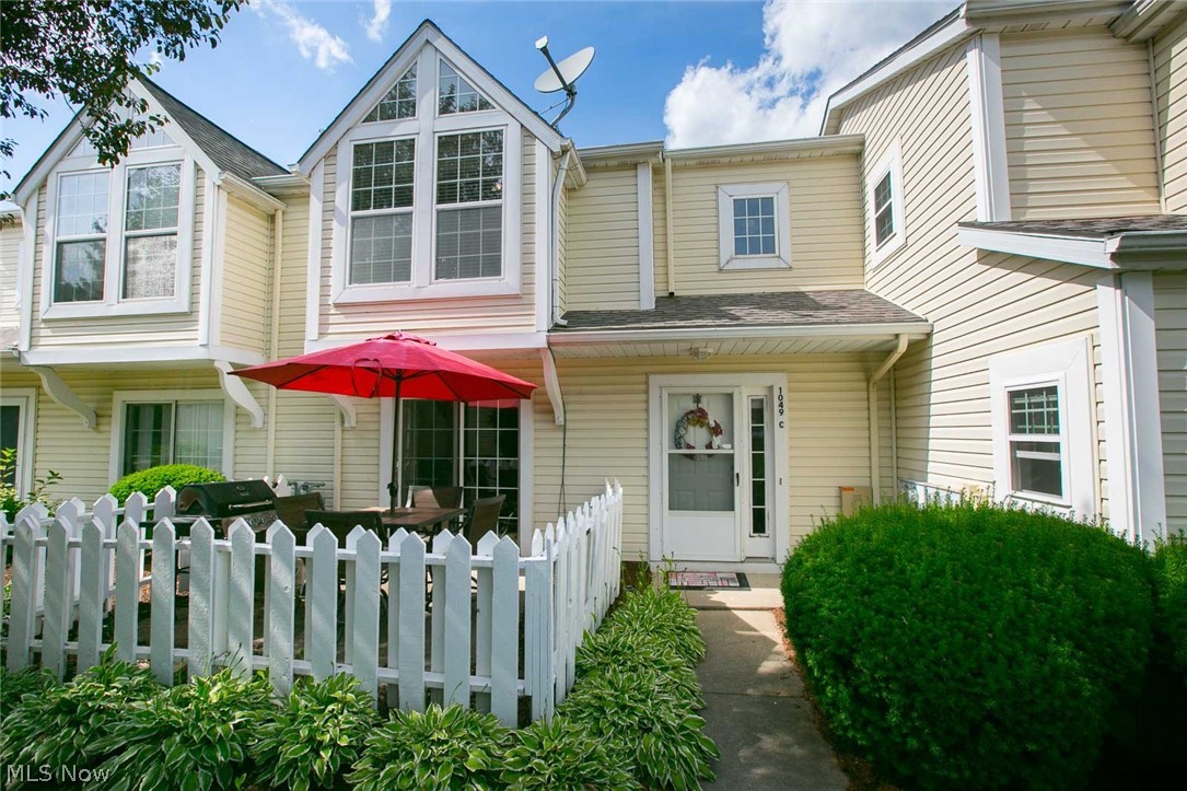 Enjoy maintenance free living! Beautifully maintained Townhome conveniently located near shopping and restaurants! Two story open foyer. Great room offers option for dining room space and includes laminate hardwood floors. Eat-in kitchen features ceramic tile floor, tile backsplash and stainless steel appliances. First floor also includes laundry, half bath and extra closets for storage. Second floor includes spacious master bedroom including walk-in closet with access to second floor bath and large second bedroom. Private fenced patio area. Attached two car garage. Plenty of guest parking. Don't miss this must see!