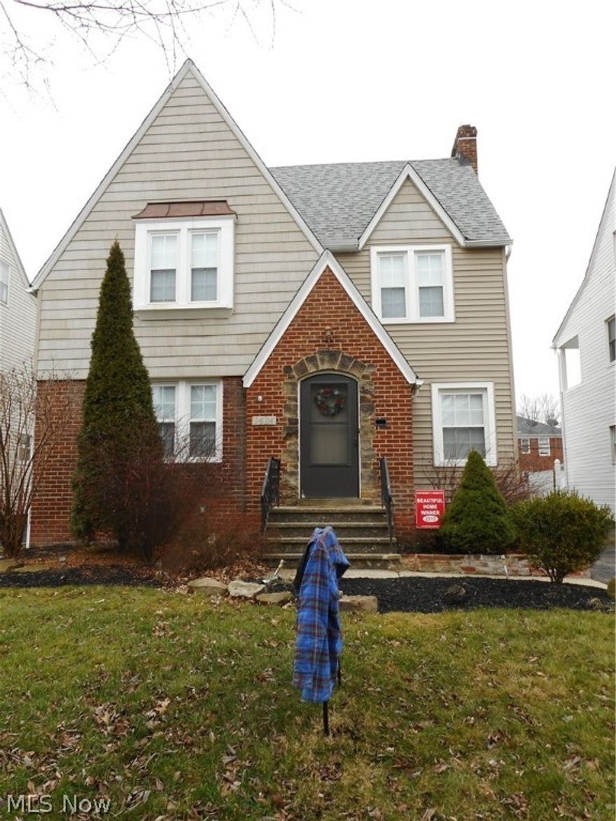 Previous winner of University Hts. beautiful home award. Solid 4 bedroom home. Newer kitchen cabinets and laminate floor. Most windows are replacement. 
Move-in condition. Younger 2 car garage. Parking for extra car or patio area in rear. Close to Cain Park, shopping, University Circle cultural hub and downtown Cleveland.