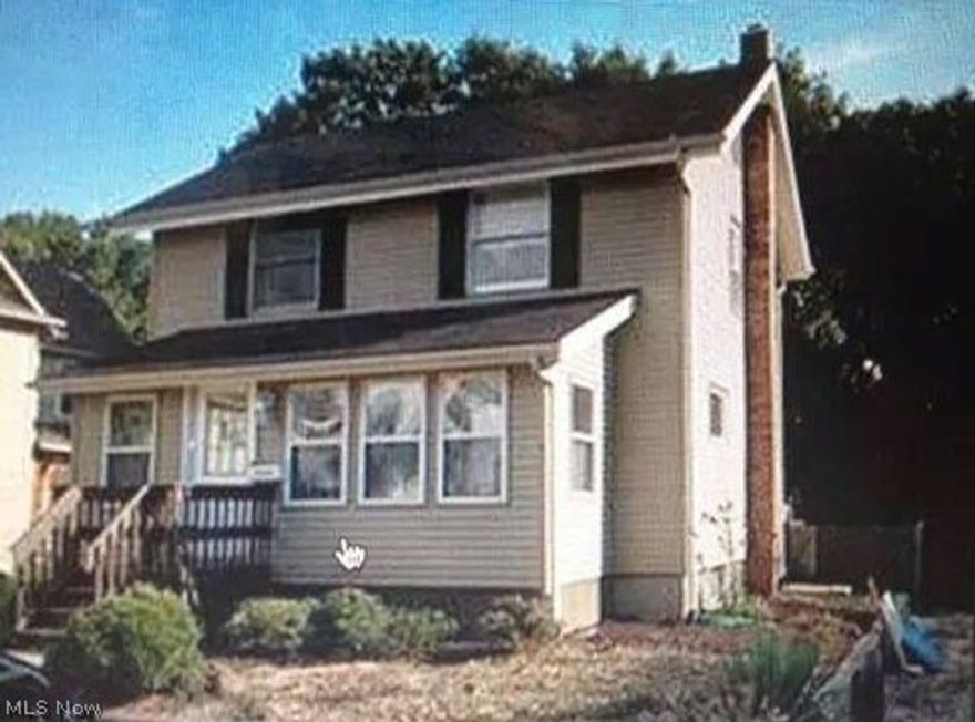 Bigger than it looks! Freshly painted, newer carpet in living room, bedroom, finished room in basement. Updated kitchen with appliances. Enclosed front porch. Deck overlooking fenced back yard. Great starter home or investor.