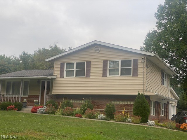 Rare opportunity to purchase this fine custom built 4 bedroom, 2 bath split level! Totally remodeled with newer windows, roof, siding, and more. Remodeled kitchen with stainless appliances and granite countertops. Sitting on almost an acre with a large detached garage/workshop. You can easily fit 4 cars in this garage or whatever "toys" you have. There is another detached one-car garage as well as the attached garage. Wow! This home was custom built by the builder/contractor for his personal home. Quality throughout. Extra insulation in the walls, siding, and attic. City water is available at the street. It's a pleasure to offer one of the most immaculate homes we have for sale!