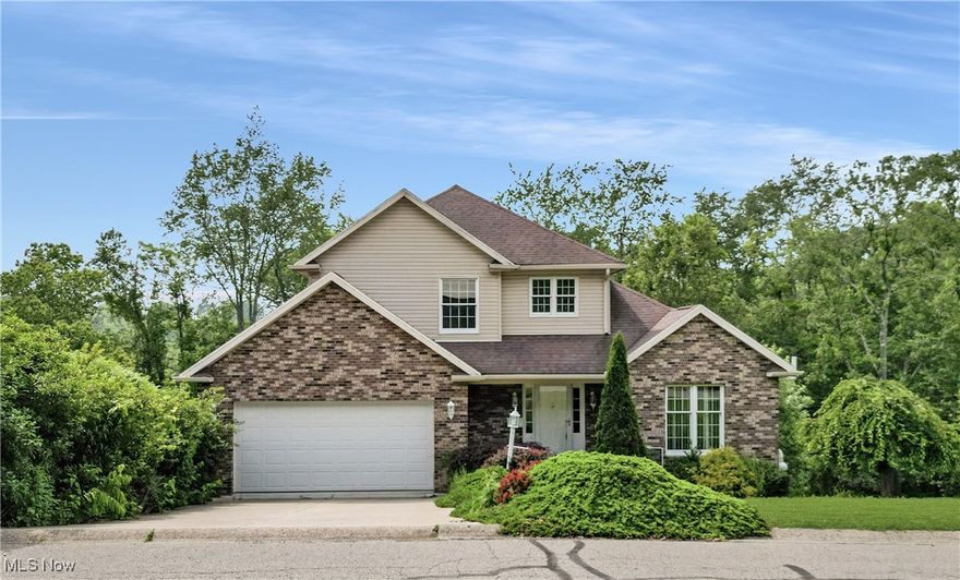 Welcome to this beautiful 3-bedroom, 2.5-bath brick home located in one of Steubenville’s most desirable neighborhoods. Built in 1999, this well-maintained home offers a great blend of space, comfort, and updates. Step into a bright and inviting foyer with a convenient half bath, flowing into an open living and dining area filled with natural light. The kitchen features custom cabinetry, granite countertops, and a peninsula perfect for casual meals. The spacious family room boasts a cozy fireplace and walk-out access to a large private deck—ideal for entertaining or relaxing outdoors. Upstairs, you’ll find three generously sized bedrooms, including a primary suite with a large soaking tub and separate shower. The finished basement offers a massive rec room with walk-out access to a covered deck and private backyard. Additional updates include a new A/C unit (2024), radon mitigation system (2024), and a new dishwasher. This move-in-ready home is a must-see!