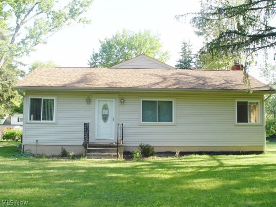 NOT JUST A DRIVE-BY! Much larger than it looks from street. Deep 1.18 acre lot. Spacious newer addition of vaulted family room, master bedroom & bath, and half bath. Full basement 40x23 under new addition has great potential for future finished living area. Updated kitchen with marble flooring and all stainless appliances included. Many recent updates include windows, roof, siding, furnace, central air, hot water tank, electrical, main bath, light fixtures and ceiling fans. First floor laundry room includes hi-efficiency washer & dryer.  Two-car detached heated garage 21x19, plus third garage 19x12 perfect for car/boat, hobbyist, mechanic, etc. Storage shed.