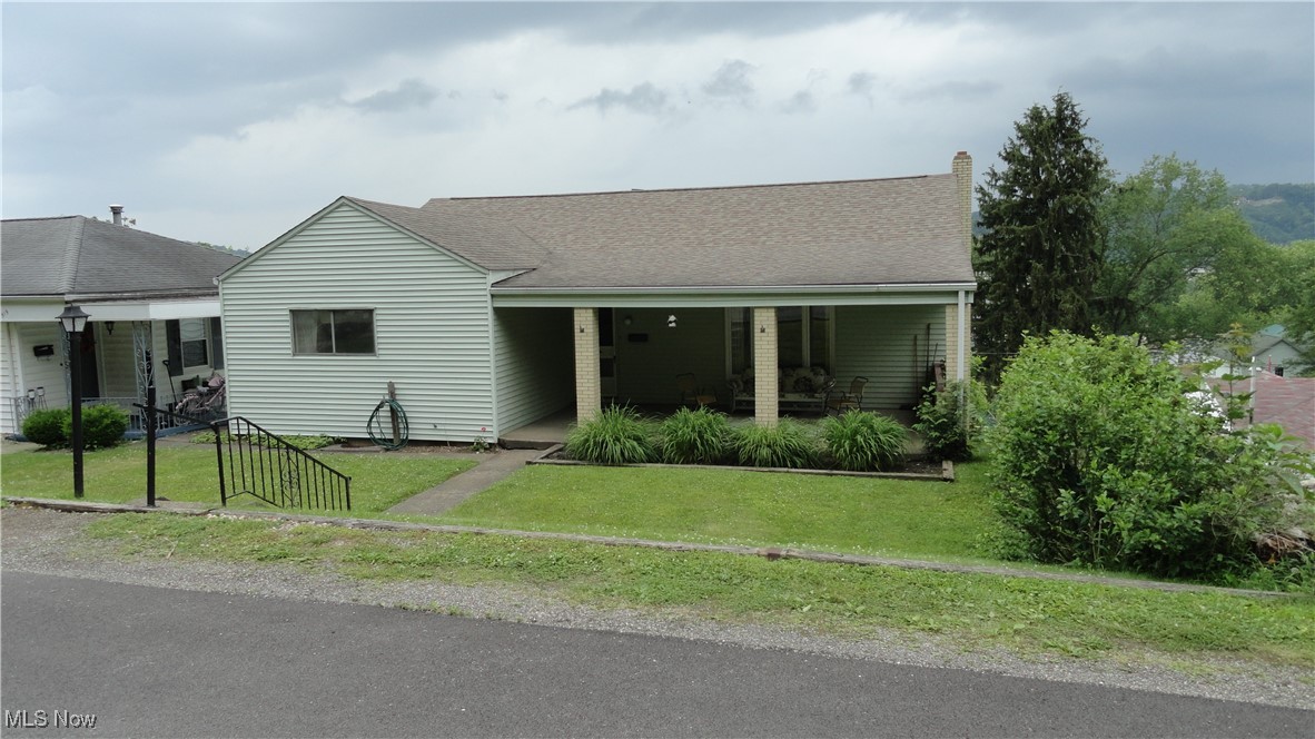 Very nice 3 bedroom ranch in town with a great view of the river and fireworks! Built by the sellers father, it is basically a one owner property. Hardwood floors in the large bedrooms, and per owner, hardwood under carpet in hall, living, and dining rooms. Circular layout with large eat-in kitchen, plus a dining room. Living room looks out to the huge covered front porch. Deck off of kitchen had to be removed, but you can see the potential! Terraced back yard provides 2 separate levels. walk out basement. Huge family room in basement with large fireplace. Other half of basement can be finished. Plumbing is there for another bathroom. Large workshop to tinker in as well. Newer roof, and updated electric. Being sold "as-is".