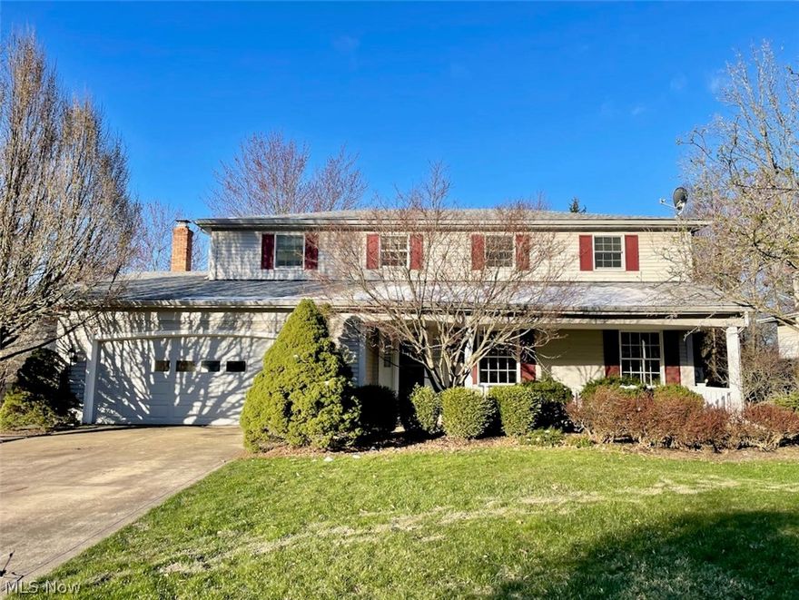 One owner meticulously maintained 4 bedroom, 3 bath colonial home in the desirable community of Hunting Meadows located in Strongsville.  Upon arriving you will observe the beautiful large covered porch and well maintained landscaping.  Upon entering the front door you will notice the beautiful hardwood flooring which starts immediately in the foyer and continues into the kitchen. The rooms are spacious and well laid out in a very comfortable/livable floor plan. The eat-in kitchen is updated and bright with white cabinetry, pendant lighting, gas stove and large bow window. The formal dining room has beautiful accent molding. The family room has beamed ceilings, a wood burning fireplace flanked by built-in book shelves and access to the first floor half bath. Directly off of the family room is a large covered patio. Upstairs you will find a large master suite with an attached bath, walk-in closet and balcony. Three more nice-sized bedrooms and another full bath round out the upstairs. The basement adds living space to this already roomy house with a recreation area with built in bar, office with included desk, and dedicated laundry room.  Schedule your private showing today!