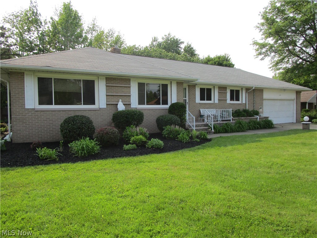 Looking for a Sprawling Ranch style home on a beautifully established street? Eat in Kitchen offers plenty of cabinets, drawers & counter space and all appliances stay! The gas/woodburning fireplace brings wonderful charm as you enjoy your spacious living room/dinning with large picture windows overlooking your well maintained yard and gardens. There are 3 good sized bedrooms with large closets. 2 Full baths. Beautiful hardwood floors, ceiling fans and some newer windows throughout. The full basement offers large family room, laundry room with work bench and built ins, cedar closet, glass block windows and plenty of storage. All this and seller is including a 1 year (APHW) Home Warranty. Make your appointment today, a MUST SEE!
