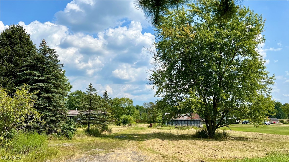 5.661 Acres with Potential for New Construction! * Explore the possibilities with this 5.661-acre property in Palmyra Township, located within the Southeast Local Schools district. While the property includes a 24 x 56 manufactured home in need of significant repair or replacement, it offers an excellent opportunity for new construction in a peaceful, country setting. PROPERTY HIGHLIGHTS: ** Acreage: 5.661 acres of land, perfect for building your dream home or a peaceful retreat; ** Manufactured Home: A 24 x 56 manufactured home is present on the property but is in poor condition, providing little to no value. This offers a clean slate for new construction or replacing the home on the existing foundation; ** Location: Enjoy the tranquility and privacy of Palmyra Township, with easy access to essential amenities and major routes; ** School District: Situated within the Southeast Local Schools district, offering quality education and a supportive community; ** Scenic Surroundings: The property features beautiful natural surroundings, making it an ideal location for your future home; ** Endless Potential: Whether you envision a custom-built home, a sprawling estate, or a cozy country retreat, this property offers the canvas to make your dreams a reality. ** This property is perfect for those looking to start fresh and build something new. Don't miss out on the chance to create your own country haven!