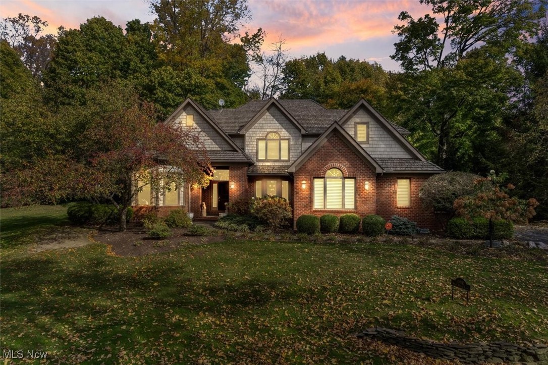 Welcome to this custom English traditional colonial in the prestigious Hanna Estates, where timeless elegance meets modern luxury. This exceptional residence opens with a two-story family room featuring custom built-ins and a cozy firelit hearth room, perfect for intimate gatherings. The designer kitchen offers a cozy breakfast nook, and the formal dining room with custom built-ins adds a touch of sophistication.
The first-floor master suite serves as a private retreat with a spacious walk-in closet and spa-like bathroom. Upstairs, you'll find three additional bedrooms, plus a versatile bonus room ideal for play, games, or an exercise area.
Set on a wooded lot, this home provides unparalleled privacy within a gated community, complete with exclusive beach access on Lake Erie and privileges at the Shoreby Club. A unique oval library with a specially crafted wood ceiling enhances the home's classic charm, while cherry hardwood floors add warmth and refinement throughout the main living areas.
Experience the perfect blend of luxury and comfort in one of Northeast Ohio's most elegant communities, just minutes from shopping, dining, downtown nightlife, and cultural landmarks such as CWRU, University Hospitals, Cleveland Clinic, CSU, the cultural gardens, and Little Italy. This property offers a rare lifestyle of refinement and convenience, a true gem in the heart of Hanna Estates.