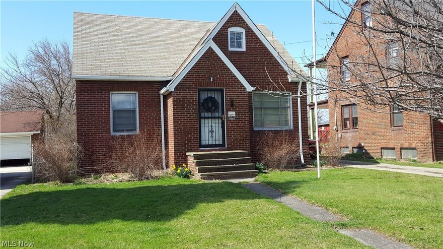 Solid brick home 2 baths 3 bedrooms full basement 11/2 car garage deep treed lot.