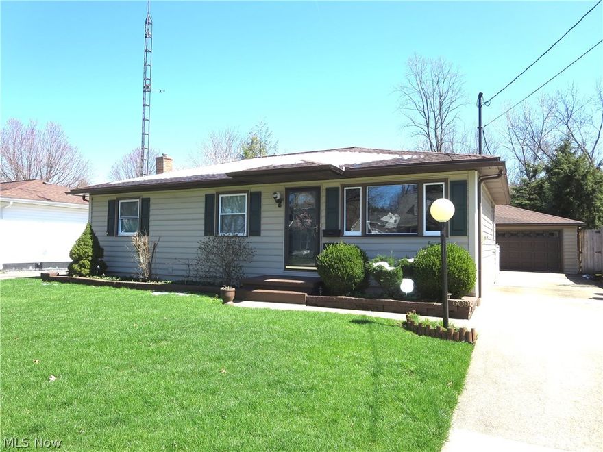 Full of surprises!  Long time owners have pampered this home and added lots of extras along the way!  Gleaming hardwood floors throughout the main level, nicely updated, fully applianced kitchen, awesome vaulted family room addition with fireplace, skylights and cork flooring.  The lower level is finished with a huge rec room with wet bar, full bath and two smaller bonus rooms.  Outside there's a gardeners paradise with gorgeous landscaping and a pond with waterfall.  Bonus time - on the rear of the garage is a very nice screened porch area to relax and enjoy the outdoors.  Two car attached garage with plenty of room for both cars and lots of storage.  There is also a potting shed and fenced yard.  Roof approximately 7 years old.