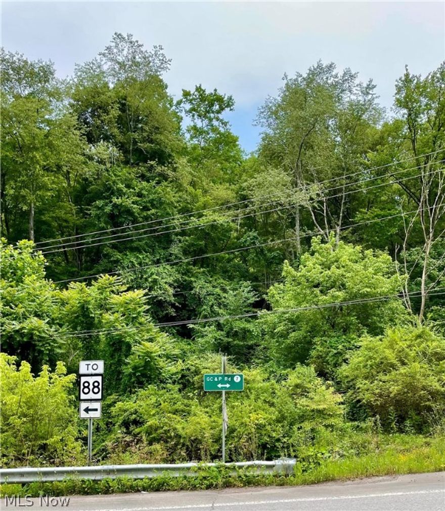 15-acre wooded lot near the intersection of G C & P Road and Short Creek Road.