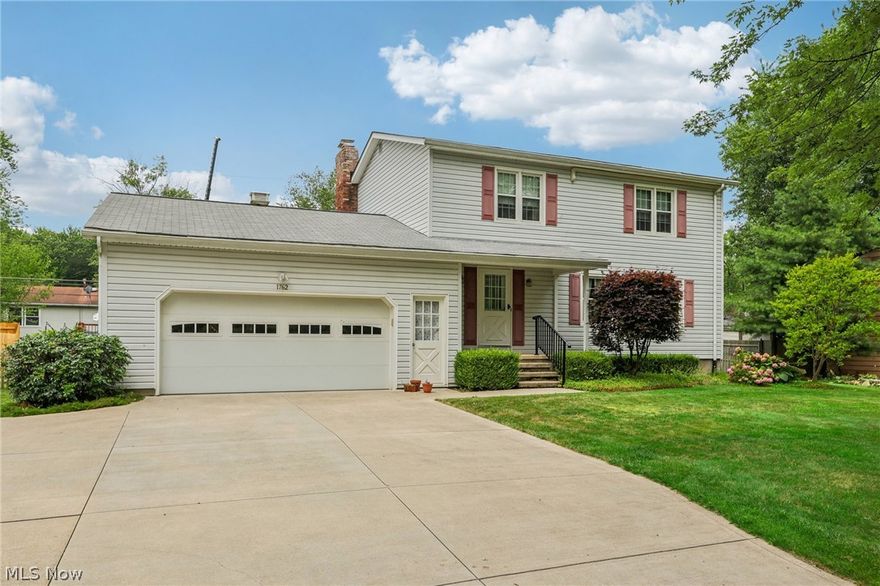 Welcome to this beautiful 4 bedroom 2.5 bath Colonial home! First time on the market, as this home has been loved and cared for by one loving family for many years. As you walk up the front steps to the front door you will immediately notice a large front porch that the whole family would enjoy. A step inside will lead you to see a spacious entryway with a gorgeous living room. Or just step down the entryway to another large family room with a brick wood burning fireplace. Yes, that is 2 large living room areas for all your entertaining. If you love cooking this kitchen is ideal for you. So much cabinet space along with counter space to prepare those meals. It is also open to the dining room area which is open to one of your living rooms. Want to have a cookout you are just steps away thru the sliding glass doors to your large tiered deck. Enjoy cooking on your grill or just enjoying the outdoors. This home is on a double lot  which makes the  fenced in backyard bigger for the kids to play or the animals to have fun and feel safe. For your family needs all 4 bedrooms are very spacious along with 2 full bathrooms on the same floor. All bedrooms have gorgeous hardwood floors. There has been a lot of updates done within the last 10yrs: Double pane fold in/out windows, Chimney has been retucked, Hot water tank only 3 yrs old, New electrical box updated to 200 amp service, deck on back only 5 yrs old, Mitsubishi Air conditioner units throughout home installed, New carpet in living rooms and upstairs. Park your cars in the oversized 2 car attached garage. If you still would like more living space the huge basement is ready to be finished along with plenty of room for storage with extra crawl space in the basement. Don't miss out on this well maintained home!