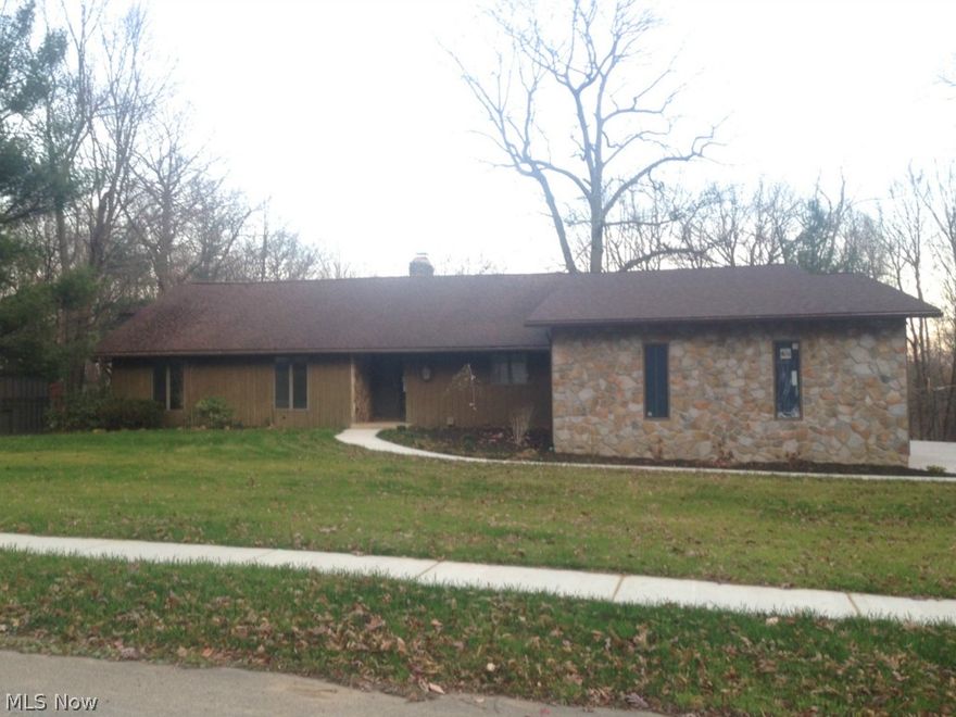 Don't let this one slip by! With over 3,200 square feet, this expansive ranch has so much to offer. Main level features 4 bedrooms, 2 full baths, a great room with fireplace and vaulted ceilings, plus well-planned kitchen/dining area offering ample storage. Master bedroom offers tall ceilings, unique loft and access to an enclosed area with built-in hot tub. The walk-out lower level is finished with 2 additional living spaces-great for entertaining, full bath, and possible 5th bedroom. Forget your worries while relaxing on the rear deck overlooking a park-like setting. An impressive property with an abundance of space.