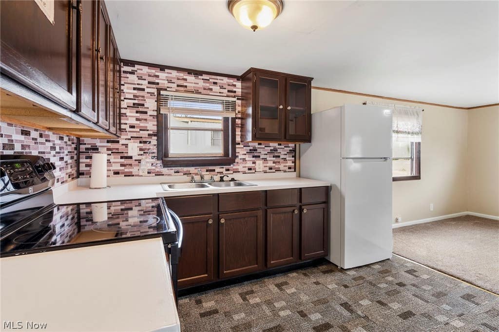 Photo of 3354 Hilton Street NW #33, Massillon, OH 44646 (MLS # 5220031)