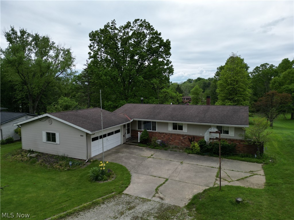 Recently updated 3 bedroom, 1.5 bath Ranch home nestled back on 0.93 acres with approximately 1,198 SF of living space. The bright kitchen features stone countertops, tasteful backsplash and an adjacent dining area. Off the kitchen is the spacious living room with a wood burning stove and a beamed vaulted ceiling. The master bedroom has a shared half bath with the kitchen. Two additional bedrooms and a full bath complete the first floor. The finished basement has a carpeted recreation room with a door to the backyard and access to the laundry room and storage. Enjoy the treed backyard from the patio of the living room. Hardwood floors throughout most of the home.