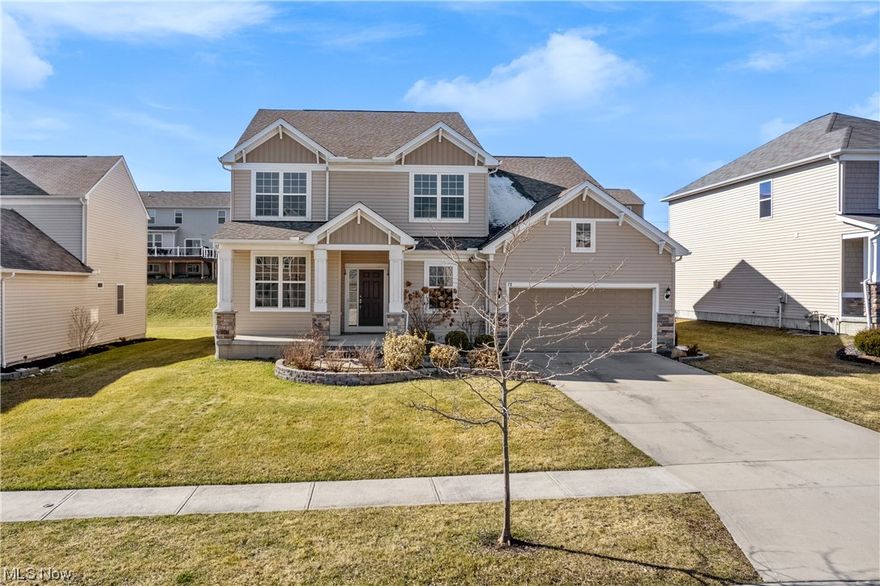 Welcome to 78 Garnett Circle, located in Copley, Ohio. This stunning 4-bedroom, 3.5-bathroom home boasts over 3,500 square feet of living space and is situated in the renowned Revere school district. Nestled in an amazing neighborhood, this home offers a beautiful exterior with meticulously maintained landscaping, creating an inviting curb appeal. Tucked away in a quiet enclave off Route 18, conveniently close to shopping centers and restaurants, the location offers both tranquility and convenience. Step inside to discover an open floor plan kitchen featuring a spacious island, high-end appliances, and elegant granite countertops. The walk-in pantry provides ample storage space, while the first-floor bonus room with French doors offers versatility for a home office or den. Cozy up by the gas fireplace in the living area, perfect for chilly evenings. The first floor also features a large mudroom, ideal for keeping your belongings organized, and luxury vinyl flooring throughout for easy maintenance. A convenient powder room completes the main level. Upstairs, you'll find four bedrooms and two full baths, including the luxurious primary bedroom suite. Pamper yourself in the beautiful ensuite bathroom with a soaker tub and enjoy the convenience of a spacious walk-in closet. The lower level of this home has been completely finished, offering a full bath and adding tons of extra living space. Whether you envision a playroom for the kids or a man cave for entertaining, the possibilities are endless. Additional highlights include a nicely appointed laundry room and a beautiful backyard with pavers, perfect for outdoor gatherings and relaxation. Don't miss your chance to own this exceptional home in a prime location. Schedule your private showing today and experience the epitome of comfortable and stylish living.