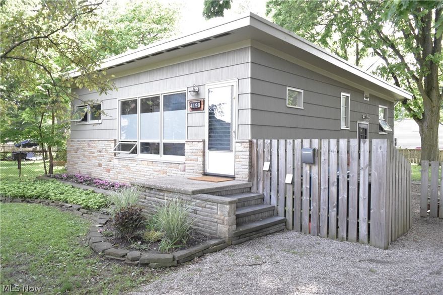 A Truly Unique Home In the Heart Of Fairview Park, This Mid Century Stunner Is A Must See! Clean Lines and Open Concept Make This Home Feel Airy and Tranquil. A Lower Level Bonus Space (Not Included in the Listed Square Footage) With Barn Door Adds Extra Space for Entertaining and Relaxing. Updates Include A Brand New Boiler Replaced 05/2019 ~ Stainless Steel Appliances ~ Paint Throughout ~ Newly Graveled Driveway ~ The List Goes On!! Set Back From the Street and With A Large, Fenced Back Yard and Patio with Built-In Seating, There Is Plenty Of Room To Enjoy the Outdoors. Less Than 1 Block from Gilles-Sweet Elementary and Easy Walking Distance to Restaurants and Grocery Store, Hope Yoga, the Gemini Recreation Center, and Library. Enjoy All That the Growing Community Of Fairview Park Has To Offer At An Affordable Price!