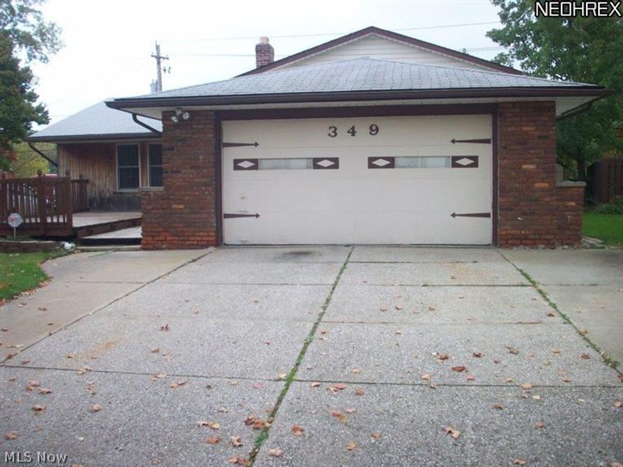 Short sale property being sold as is * Nice looking ready to move into property * A lot of natural wood * Beautiful kitchen * 1 1/2 baths, attached garage and family room with a gas fireplace * Front deck and back patio area overlooking wooded view * Close to highway and downtown  * A lot of living area *