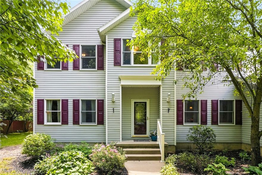 Located in the highly sought-after Highland Local School District, this beautifully maintained Colonial blends timeless style with modern comfort. Brazilian Cherrywood floors flow through the main level, leading to a gourmet kitchen with marble island, granite counters, and custom cabinetry. The kitchen opens to the living room and a four-season sunroom with fireplace and views of the stocked pond. Step outside to a stamped brick patio with built-in outdoor fireplace, perfect for entertaining or relaxing. The main-level primary suite offers a spa-like bath, jetted tub, walk-in shower, and attached office. Upstairs you’ll find a second primary suite, two additional bedrooms, a full bath, and a large bonus room. Additional highlights include fresh paint and new carpet in 2025, first-floor laundry, whole-home generator, three-car garage, outdoor shed, and a clean lower level ready to finish. Convenient to Fairlawn, Akron, and Cleveland. Don't waste a moment schedule to tour today.