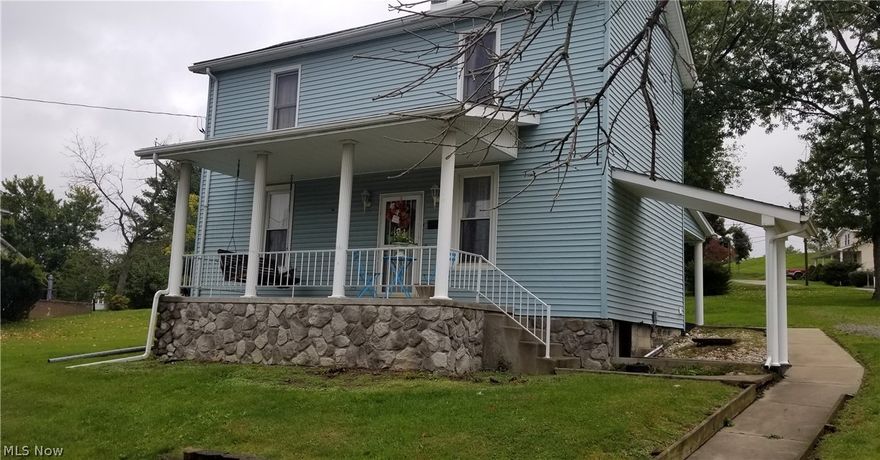 Need space? This spacious 3 bedroom 1.5 bath home is on two lots!  Lot has parking in front of the home and in the rear from the alley.  Shed also goes with the home.  Two large rooms for dining or living room 1 with a gas insert fireplace and also a nice eat in kitchen.  Three bedrooms are all good size.  You will enjoy the oversized covered front porch with a swing and the covered rear porch that leads right into the kitchen. First floor laundry hook ups. Home Warranty! Check this listing out soon!