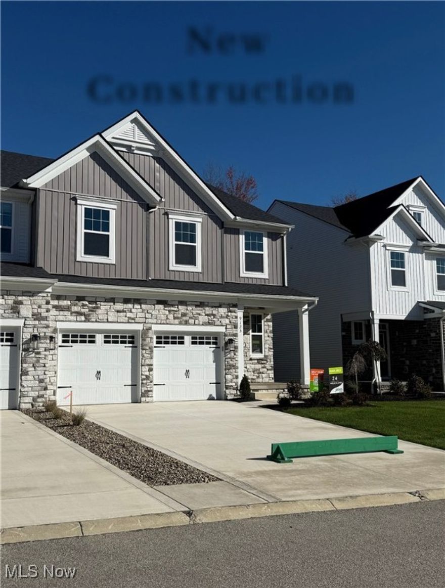 Now Complete! The Libby by Drees Homes at The Ledges in Broadview Heights! This stunning end-unit townhome lives like a spacious single-family home and features an oversized backyard lined with mature trees a rare find for low-maintenance living! Inside, the two-story family room is an absolute showstopper, flooded with natural light and anchored by sleek gray cabinets, granite countertops, and an open-concept layout made for modern living. The chef-inspired kitchen boasts quartz countertops, a tile backsplash, large center island, and stainless steel appliances, all set against luxury vinyl plank flooring throughout the main level. Step outside to the covered rear porch a perfect spot for relaxing or entertaining in any season. Upstairs, the expansive owner’s suite offers a private retreat with a generous walk-in closet and a spa-like tile shower. Two additional bedrooms, a full bath, and a second-floor laundry room add convenience and flexibility. A finished basement provides even more living space for entertaining, working from home, or hosting guests. Enjoy a peaceful, well-maintained community with low $150/month HOA fees. Low maintenance living giving you more time to enjoy your beautiful home. Schedule a time today to see this home before it is gone!