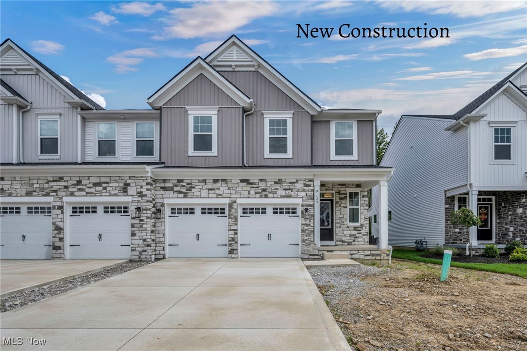 Now Complete! The Libby by Drees Homes at The Ledges in Broadview Heights! This stunning end-unit townhome lives like a spacious single-family home and features an oversized backyard lined with mature trees a rare find for low-maintenance living! Inside, the two-story family room is an absolute showstopper, flooded with natural light and anchored by sleek gray cabinets, granite countertops, and an open-concept layout made for modern living. The chef-inspired kitchen boasts quartz countertops, a tile backsplash, large center island, and stainless steel appliances, all set against luxury vinyl plank flooring throughout the main level. Step outside to the covered rear porch a perfect spot for relaxing or entertaining in any season. Upstairs, the expansive owner’s suite offers a private retreat with a generous walk-in closet and a spa-like tile shower. Two additional bedrooms, a full bath, and a second-floor laundry room add convenience and flexibility. A finished basement provides even more living space for entertaining, working from home, or hosting guests. Enjoy a peaceful, well-maintained community with low $150/month HOA fees. Low maintenance living giving you more time to enjoy your beautiful home. Schedule a time today to see this home before it is gone!