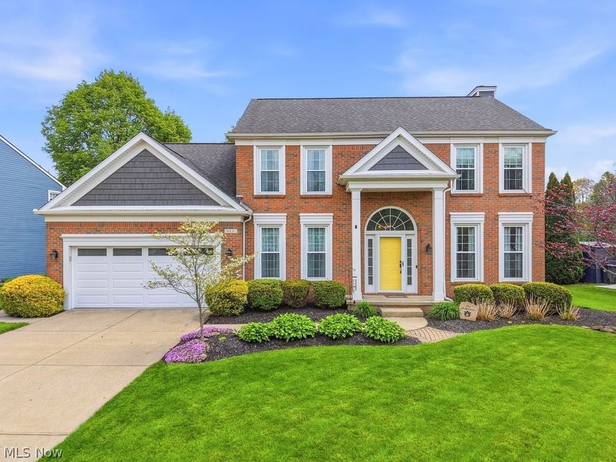Nestled in the highly sought-after Eaton Estates, this crisp, clean brick-front Pulte colonial exudes timeless charm and style. Boasting 4 spacious bedrooms and 3 updated bathrooms, the home features a bright, open floor plan with durable vinyl flooring from 2018. A complete kitchen renovation in 2023 brought new cabinets, hardware, a stylish backsplash, quartz countertops, and soft-close pull-out drawers. In 2024, a brand-new refrigerator was added, along with a range, dishwasher, microwave, and disposal—all from 2022. The windows, roof, and HVAC system were updated in 2015, and the hot water tank was replaced in 2021. The garage door and epoxy floor were added in 2025 to the attached 2 car garage.  Ceiling fans were installed in all the bedrooms in 2024. A luxurious master bath renovation in 2025 introduced new flooring, countertops, hardware, lighting, fresh paint, and carpet in the closet. The laundry room floor was also updated in 2025, and the washer and dryer stay. The entire home was resided in 2024, and a new composite deck was added in 2025. Carpeting was replaced in 2025 on the staircase, upper hallway, all bedrooms, and the great room. The gourmet kitchen opens seamlessly to a sun-drenched great room—perfect for entertaining with a gas fireplace. Outside, a private backyard oasis awaits with a composite deck completed in 2025. The home includes a invisible dog fence & collar.  In the recently finished basement find an entertainment space, a bar area, a workout area and storage.  A perfect blend of elegance, modern updates and comfort—this significantly updated home is ready to welcome you!