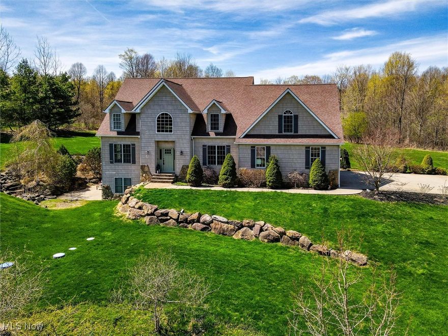 Come enjoy the privacy of this custom built home, located on a cul-de-sac with 3.46 acres! If you have a large family or looking to have one, this 5 bedroom 3 1/2 bath colonial has so much to offer! Totally remolded kitchen with quartz counter tops, island bar, new cabinets, all new GE CAFE stainless steel appliances w/smart app connection, trash compactor & a built in wine cooler! Enjoy the access to the backyard, with a patio slider off the kitchen onto a beautiful composite deck! Enjoy the openness of the 2 story great room, with the abundance of natural light from the skylights & highlighted by a gas log fireplace! The spacious first floor master suite features a walk in closet, a whirlpool tub and his and her sinks, as well as a glass shower stall. The second floor features 3 spacious bedrooms & a loft area. The added uniqueness of the second floor is the large bonus room which is currently being used as a gaming/recreation room & another bonus room being used as an office.  The fully finished lower level has a walk out to a beautiful stone patio, with an additional bedroom, walk in closet & a full bathroom.  So many updates throughout this home, including a new tankless hot water heater, coax to ethernet w/ 1 gig ports, built in reciprocals with night lights, freshly painted, upgraded LED lighting, new main level half bath, new flooring throughout the home! Truly a home you need on your schedule to see!