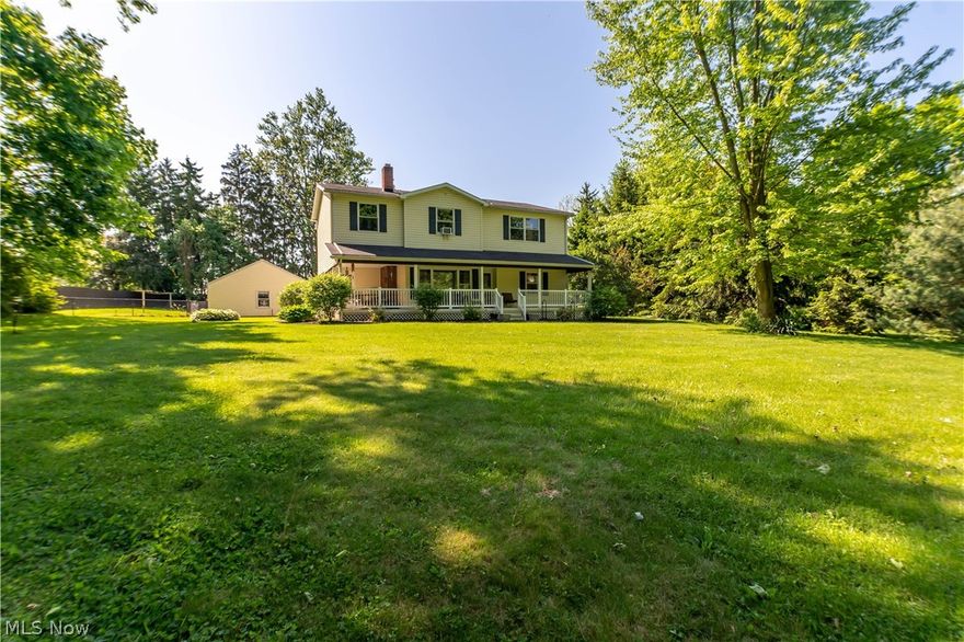Welcome home to 5671 Akron Road! Tucked nicely away on 1.82 acres your own private oasis awaits! With over 4000 Sqft of space this home will not leave you needing for more space! The kitchen features custom cabinets and granite countertops! A formal dining room and spacious living room can also be found on the main floor along with one bedroom and a full bath! Originally built in 1958 as a single story home the second level was added in 2009. The remining bedrooms and two additional full bathrooms can be found upstairs. Walk through the large primary bedroom and off of the en-suite your new massive 17ft x 11ft walk in closet awaits! Downstairs you'll find separate space for all of your storage needs along with an additional large finished living space! Featuring a wrap around porch perfect for sitting back and relaxing while enjoying the serene views and a back deck perfect for entertaining, this home truly has all that you need! Located in Green Local School district this property keeps you close to where you need to be while still giving you your own tucked away place to call home! Call today to schedule a private showing!