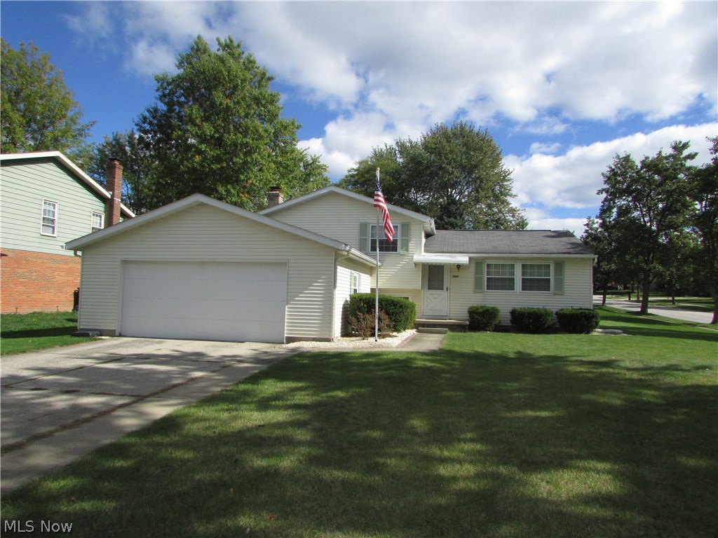 $10,000 PRICE REDUCTION! An exceptional Sherwood Acres split level with 4 bedrooms, and 2 full baths. Sherwood Acres Subdivision offers an excellent kid friendly park open to all. An updated kitchen features newer granite countertops, newer cabinets, and stainless steel appliances. A large family room has a fireplace. The cozy living room opens to the dining room and kitchen. Each bedroom is spacious. The lowest level is partially finished, with high efficiency furnace with c/a. There is an attached 2 car garage, ample storage, and so much more to offer.