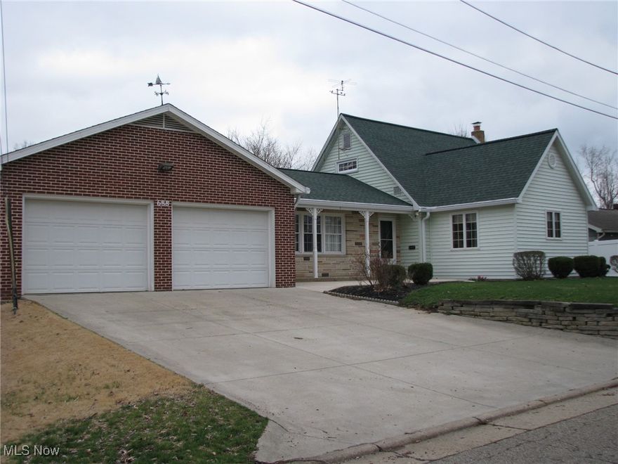 A well-maintained home in town with an exceptionally large lot.  This home features a large living room for all your gathering and entertaining.  A well-appointed kitchen with appliances and lots of cabinet space.  A main floor bedroom and a main floor laundry with washer and dryer.  Upstairs is two bedrooms and good amount of storage.  The two-car attached garage is heated and spacious. The basement features a finished room with a wood stove (a good amount of wood left by the seller). Included downstairs is a bathroom and a sauna.  The basement has an ample amount of storage areas.  Off the rear deck/porch is a three seasons room facing west to enjoy many sunsets.  A large, fenced area only accessible to the house or garage is a benefit for a pool or a nice garden protected from the wildlife.  Mechanicals for the property include a newer gas furnace(2010) a whole house 15K generator and a sauna.  Two sheds in the back of the property and storage under the three-season room rounds out the property.  This property is well maintained and will be enjoyable for years to come.