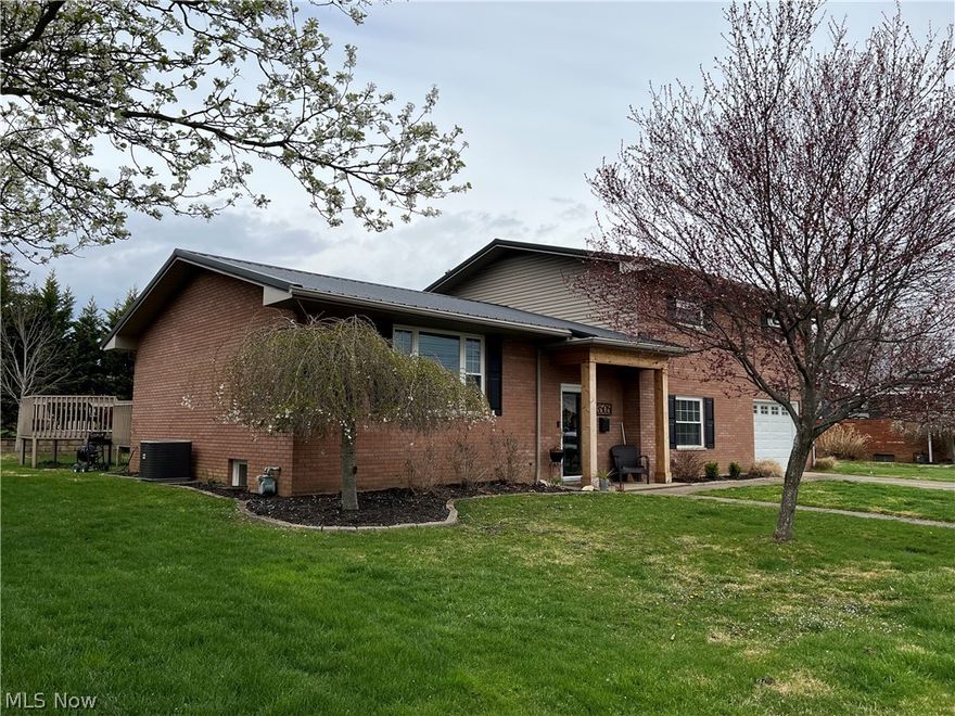 This beautiful UPDATED well maintained home with an open concept, perfect for entertaining. 4 Bed 2 1/2 Bath located on a dead end street.  Custom kitchen cabinets, all new bathrooms, private back deck with a built in cabinet wired for a TV. NEWer metal roof, windows and HVAC! This home is MOVE IN READY!