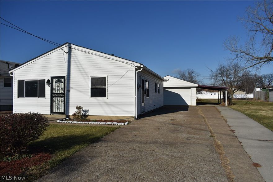 Take immediate possession of this one story home that includes two parcels and a two car garage with a carport! Located very close to Cedar Point. Measurements, square footage and dates are approximate.