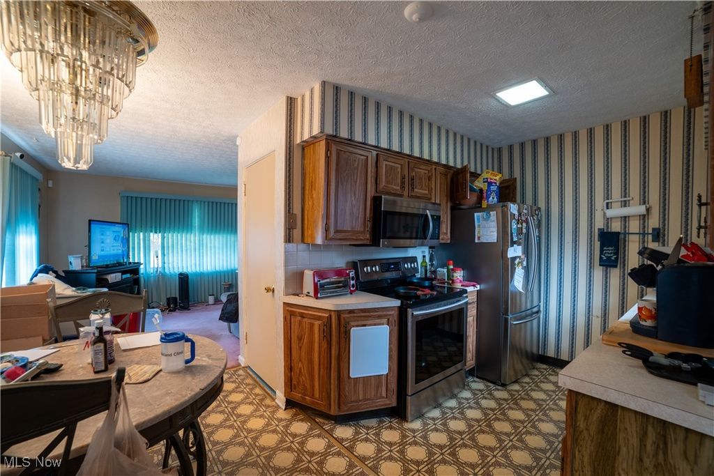 Photo of 1153 Packard Drive, Akron, OH 44320 (MLS # 5172662)