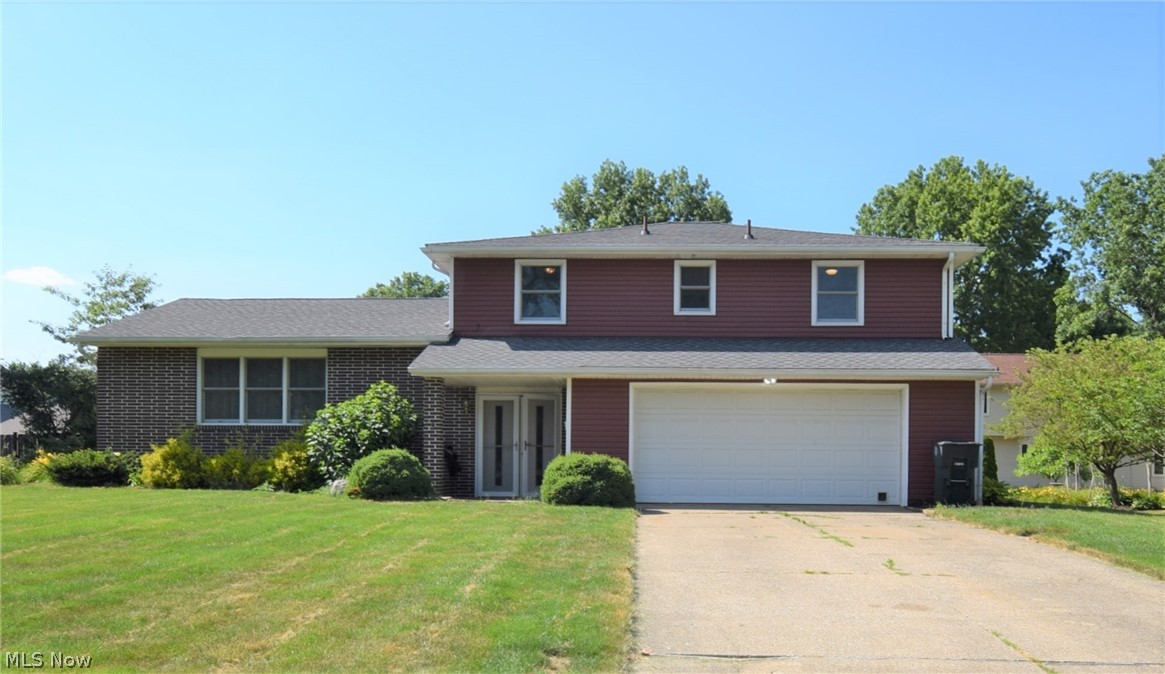 Welcome to 330 Windfall Lane in Wadsworth! Step inside this home to find gorgeous hardwood floors throughout the spacious main level, including the living room, dining room, and kitchen. The spacious eat-in kitchen has an abundance of counter space and beautiful oak cabinets. The den has a brick fireplace and access to the covered back patio that overlooks the backyard. Four large bedrooms are located upstairs; the master suite has a convenient attached bathroom. The second bathroom on the second level has double sinks. Laundry is located in the basement. Two-car attached garage. Home conveniently located near Wadsworth High school and Middle School.Don’t let this one get away!
