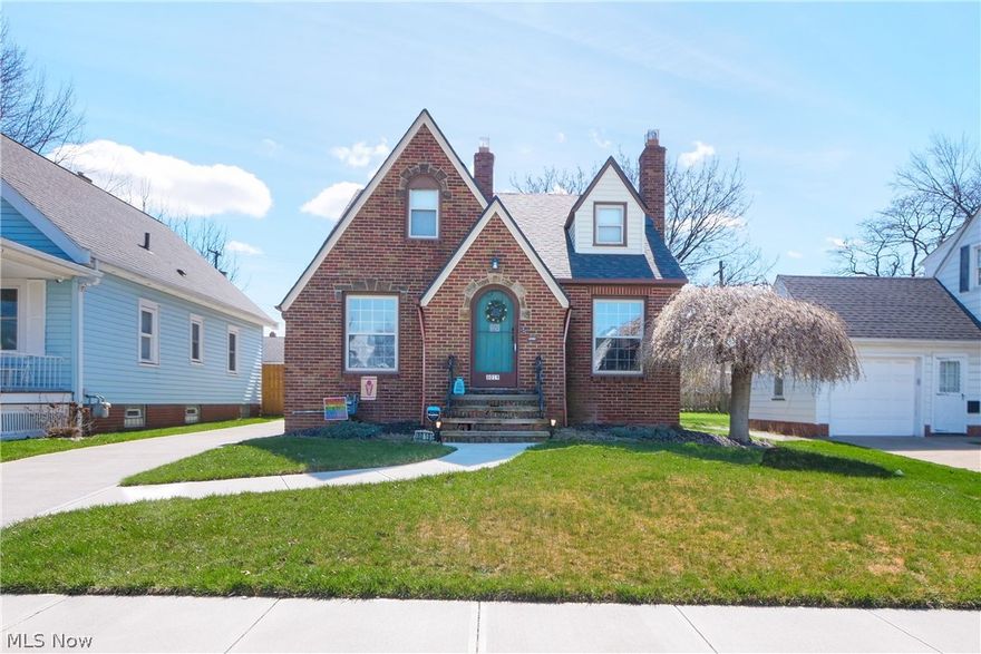 Welcome to 8019 Essen Avenue. This 3 bedroom 2 bath brick cape cod is a must see! A beautiful blend of original charm and modern updates makes this a great place to call home. As you enter the home through the front vestibule you will immediately notice the original touches of coved ceilings, hardwood floors and decorative fireplace. Making your way through to the dining room, the abundant natural light floods the room. The built in corner cabinets with leaded glass doors, ceramic tile flooring and easy flow to the kitchen provides a great space to host. The kitchen is partially open to the dining room and includes newer appliances. Making your way down the hall is the updated main floor bathroom and two bedrooms with hardwood floors. There is ample storage on the main floor with three linen closets in the hallway. Upstairs is the large primary bedroom with high ceilings, newer laminate flooring, black out shades, a walk in closet and a second closet for extra storage. The basement is partially finished and provides the opportunity for more living space, the second full bathroom and the laundry room. Outside is the ultimate entertaining space with a covered back porch, concrete patio and well kept yard; all enclosed by a privacy fence. The detached two car garage and newer driveway complete the outside. If you are looking for an all brick home with charming features in Parma, you've found it. Call today to schedule your showing and make this your new home!