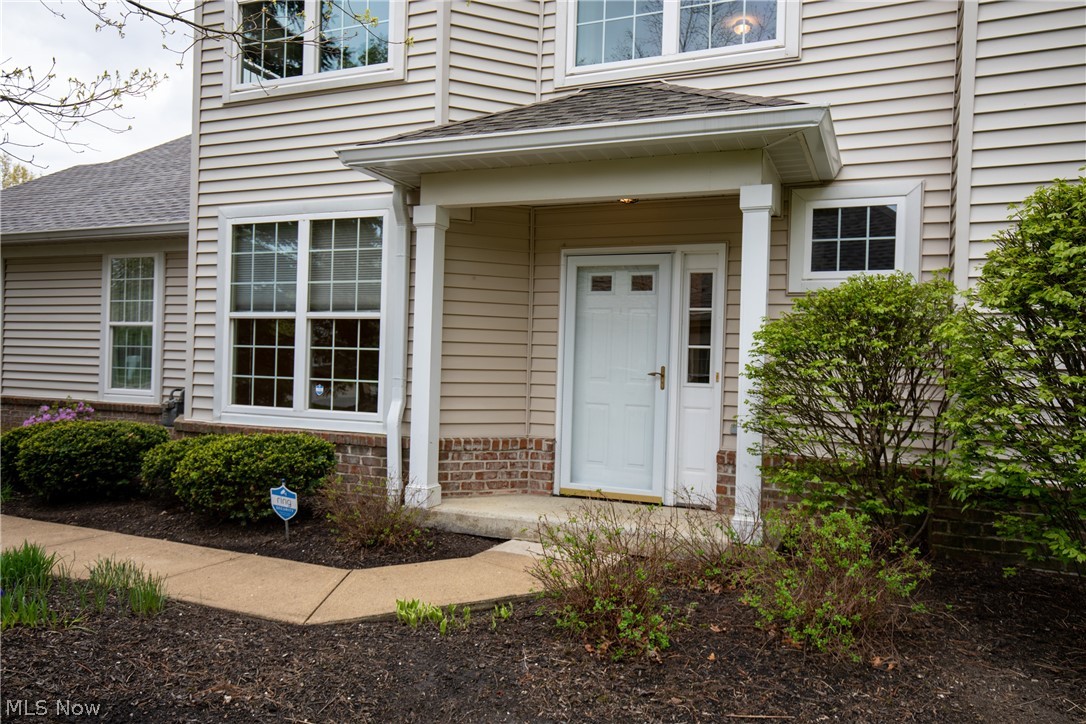 Spectacular location in the much sought after Wyndgate Club! Steps to Crocker Park! This beautiful three bedroom, three bath end unit offers a very private patio with beautiful wooded views. An open, well designed floor plan with tall windows fills this lovely space with lots of natural light. Mostly hardwood floors on first, featuring an oversized living room with gas fireplace and pretty views of the backyard along with a slider to the patio making it a great place to relax and entertain. Up, you'll find the awesome owners' suite with a trey ceiling, large windows, a huge walk-in closet, an oversized bath with double sinks, a nice soaking tub and walk-in shower. Two additional bedrooms are of equal size and share a second bath. First floor laundry room conveniently located off the oversized two car garage with plenty of room for cabinetry and storage. Newer washer, dryer, range and air conditioning condensing unit. Neutral decor throughout awaits your decorating ideas.