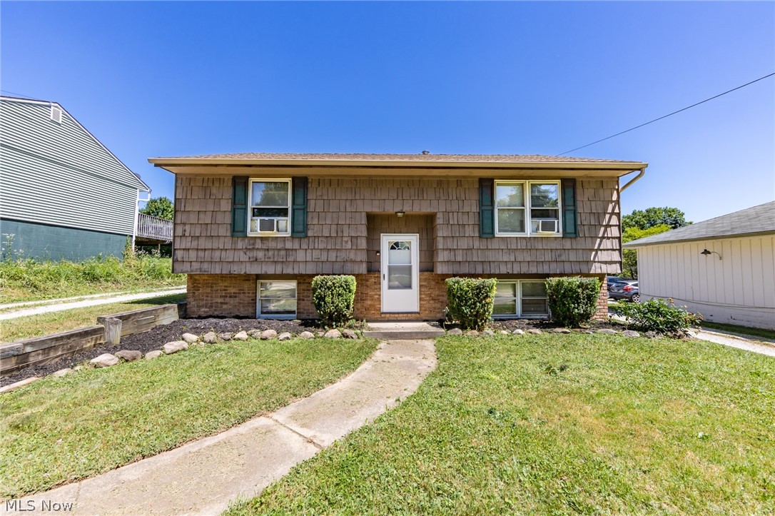 Check out this incredible opportunity to own a FOUR bedroom TWO FULL bathroom bi-level in the Ellet school district. Walk in the front door, and find two of the bedrooms and one bath on each floor. Both floors also feature a living area with the larger living area being downstairs, and an upstairs kitchen. Relax on the back deck, or hang around the fire pit with friends this summer! The bi-level three doors down just sold for $160k. Move fast because this one is priced to sell!!