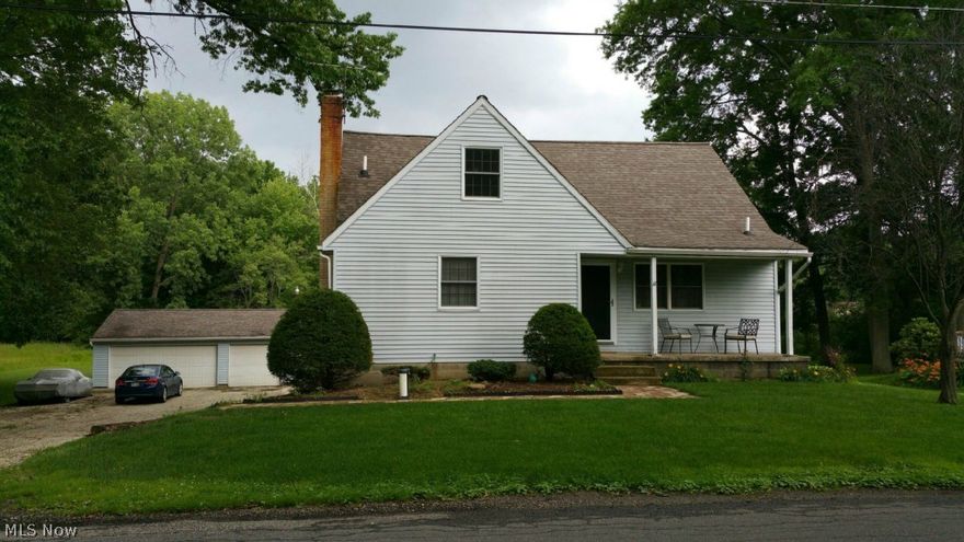 Updated Bungalow on dead end street. New laminate floors on first floor. Kitchen opens up to a 2 Story Deck over looking a large backyard! First Floor Master w/ Large closet. Both bathrooms have been recently updated. Walkout basement is plumbed and ready for 3rd bathroom.