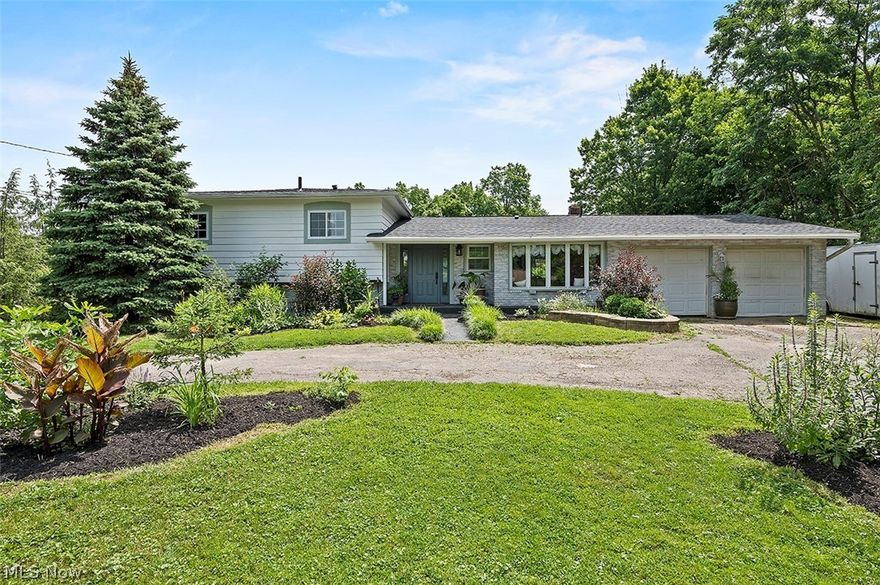 An absolute beauty in coveted Sagamore Hills, just a short distance to The National Park, Brandywine Falls, walking trails, highway access, and much more. Pride of ownership will wow you. Enter through the front door to a living area with tall ceilings and beautiful natural light. A dining area awaits with a newer sliding glass door that opens up to your deck and back yard. The deck was redone in durable composite boards.  Take a stroll through the garden and enjoy the perfect balance of green trees and wide-open spaces. Back inside, the kitchen is stocked with newer top grade, stainless steel appliances, which will all stay with the home.  The cabinets are solid wood, countertops are granite, and flooring is Turkish marble. Enjoy breakfast in front of the bay-style windows. The attached garage is an oversized 2 car. Downstairs you will find a cozy rec room with wood-burning fire place, and walk out basement. The master suite is on the lower floor, featuring separate walk-in closets. T