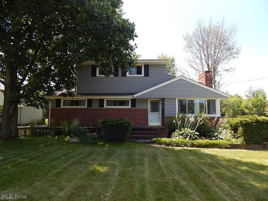 This spacious 2-story home is located on a 75x300 ft lot that backs up to the woods. Brick & vinyl siding, large deck, 2-car detached garage, & lean-to shed for storage. Enjoy a remodeled kitchen w/white cabinets & tile floor. 2 Large bedrms & full bath up. 3 Bedrms & full bath on 1st floor. Newer windows, 6-panel doors, new front & rear doors. Full basement, paneled rec rm, work shop. New furnace 2014, screen door 2015, dishwasher 2014, newer roof.